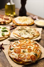 High angle mini pizza wood table