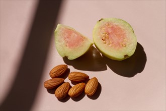 Cut guava fruit with almonds