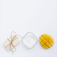 Flat lay cream soap mango with copy space