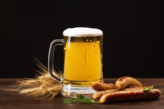 Close up beer mug with sausages