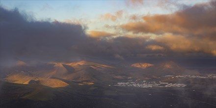 Panorama at sunrise from the Montana de Guardilama to the wine-growing area La Geria