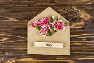 May text wooden block envelope with red carnation flowers