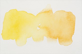 Smears bright yellow watercolor