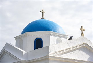 Blue dome of the Cycladic Greek Orthodox Church Holy Church of Agios Nikolaos of Kadena