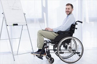 Side view man wheelchair