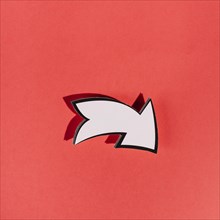 White directional arrow red background