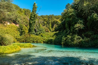 Cold waters of the river of The Blue Eye or Syri i kalter in the mountains of southern Albania