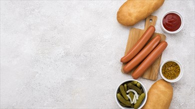 Hot dog ingredients with copy space top view
