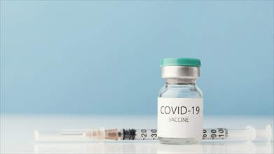 Arrangement with coronavirus vaccine bottle