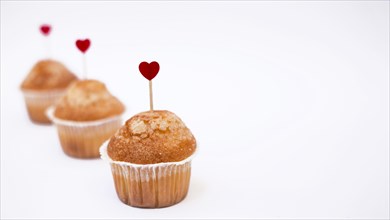 Cupcakes with small heart toppers