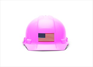 Pink hardhat with an american flag decal on the front isolated on white background