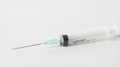 High angle syringe white background