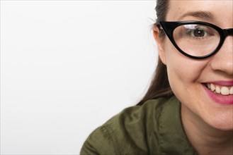 Smiley young woman with glasses