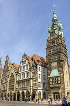 Town hall tower with gabled houses with archways on Prinzipalmarkt
