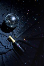 Disco ball with champagne bottle floor