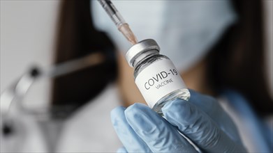 Doctor preparing covid 19 vaccine