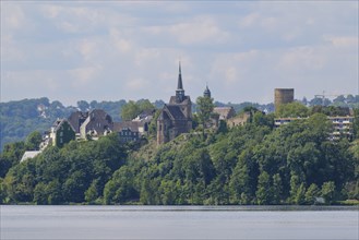 City view with castle ruins at the Harkortsee