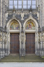 Entrance portal with mosaic at the St Lamberti Catholic Church on Lambertikirchplatz