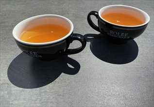Two cups of Bolee Cidre