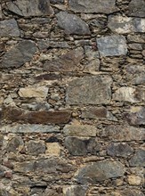 Natural stone wall in the courtyard of the collegiate church of Sankt Veit