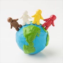 Front view plasticine earth globe with people