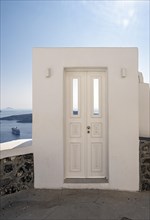 White Door and view of sea wirth cruise ship