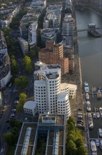 View from the Rhine Tower of the modern architecture of the Neuer Zollhof building and Gehry buildings next to the Duesseldorf Marina and the Media Harbour