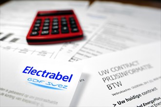 Red calculator and Flemish invoice of Electrabel