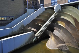 Modern Archimedes screws of pumping station used to drain the polders at Kinderdijk in Holland