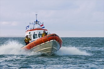 Rescue boat during exercise at sea by the Dutch coast guard at Texel