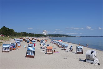 Maritim Hotel and roofed wicker beach chairs along the Baltic Sea at Timmendorfer Strand