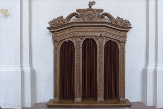 Confessional in the baroque pilgrimage church of St Landelin