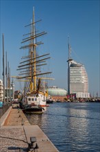Sail training ship Germany in the New Harbour with the Atlantic Sail City Hotel
