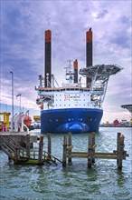 Offshore jack-up installation vessel Vole Au Vent moored at REBO heavy load terminal in Ostend port
