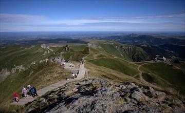 Hiking trail over wooden steps up to the Pic de Sancy