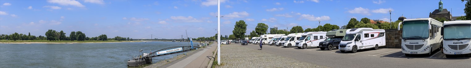 Panoramic photo of motorhome pitches on the banks of the Rhine