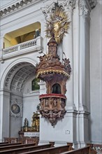 The richly carved pulpit