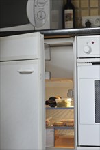 Energy loss by leaving door of refrigerator open