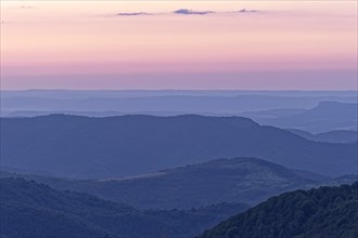Evening mood over the mountain landscape of the Balkan Mountains and the forested slopes of the Balgarka nature park Park in Central Bulgaria. Shipka
