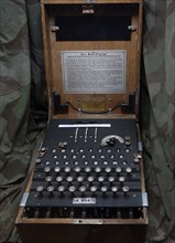German World War Two Enigma machine in wooden box for encoding military messages
