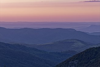 Evening mood over the mountain landscape of the Balkan Mountains and the forested slopes of the Balgarka nature park Park in Central Bulgaria. Shipka