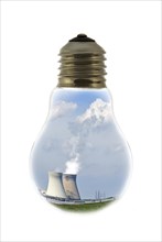 Cooling towers of nuclear power plant inside incandescent lamp