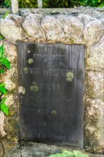 Gravestone from German colonial times Colonial rule in imperial times in Colonia Capital of Yap State on Yap Island with inscription Conrad Hofschneider born 9 November 1881 in Weinsdorf near Hanover ...