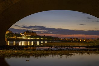 Silhouette of Dresden's old town in the evening on the Elbe