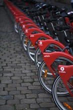 Red rental bikes