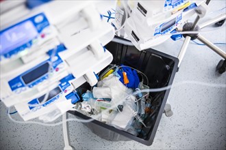 Bin with hospital waste in an intensive care unit