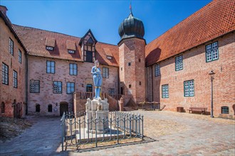 Inner courtyard with Roland statue of Bederkesa Castle in the mud spa