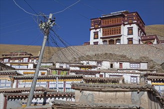 Telephone lines at Tibetan monastery Sershu Dzong in the village Sershu