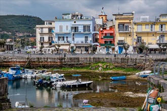 Houses on the waterfront of the fishing port of Darsena dei Pescatori