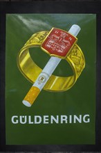 Old 1950s advertising metal plate of the cigarette brand Gueldenring